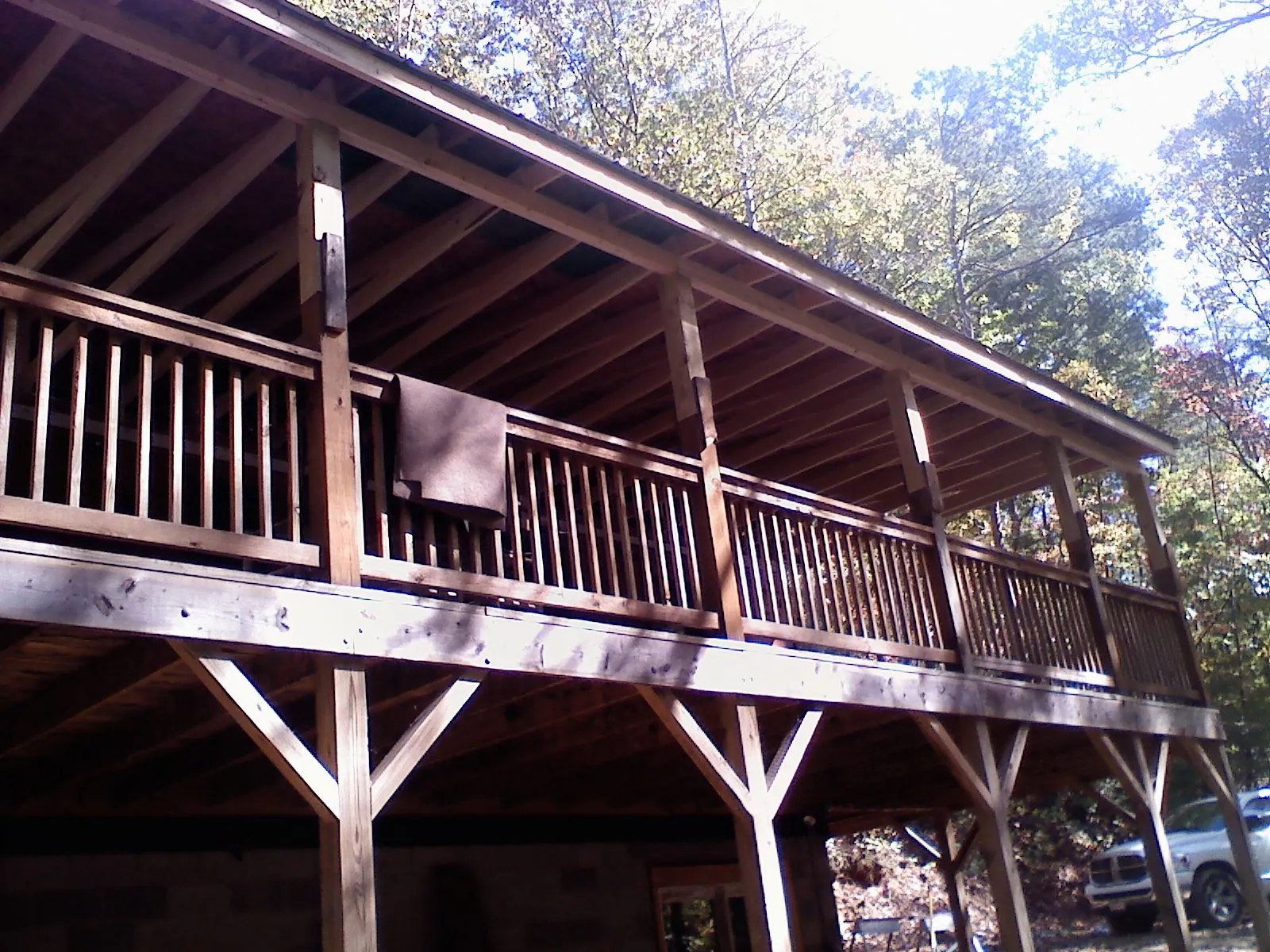 Timber framing under a new elevated porch and deck — Roof Leak Repair in Inkster by Roofing Brothers